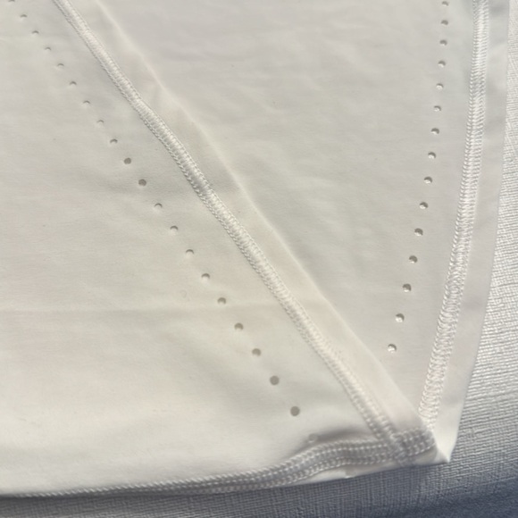 75. Lululemon White TShirt with Laser-cut Hem - Picture 3 of 4